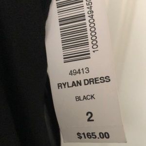 Aritzia Dresses - Black dress; open back made of Japanese fabric Aritzia Dresses - Black dress; open back made of Japanese fabric